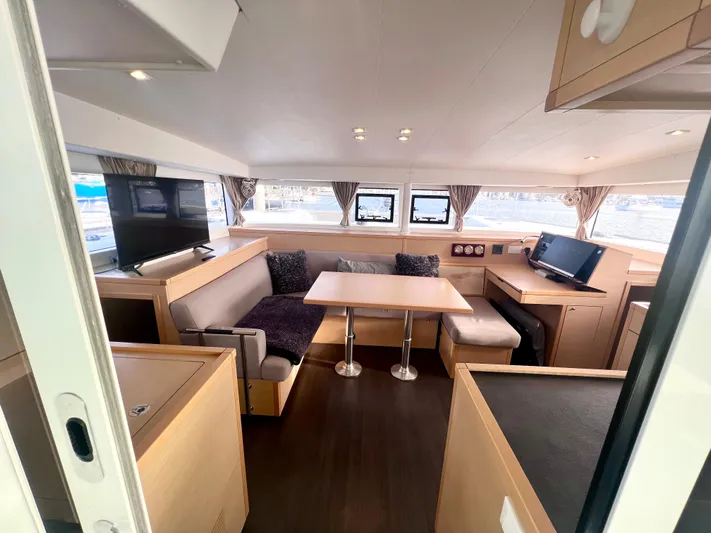 Celestra Yacht Photos Pics Interior of 2017 Lagoon 400 S2 catamaran with modern seating and entertainment area.