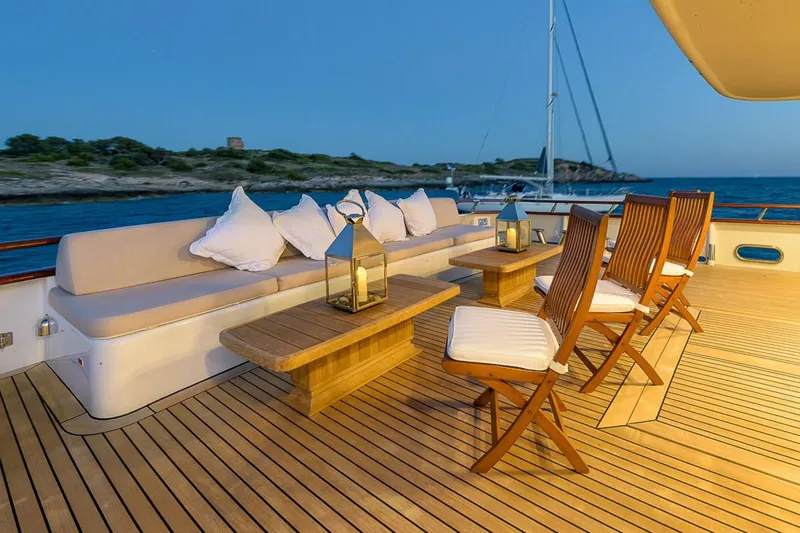  Yacht Photos Pics Luxurious deck of 1995 Cantieri Navali Nicolini 43 yacht with elegant seating and lanterns.