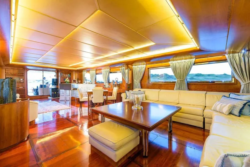  Yacht Photos Pics Luxurious interior of 1995 Cantieri Navali Nicolini 43 yacht with elegant seating and lighting.