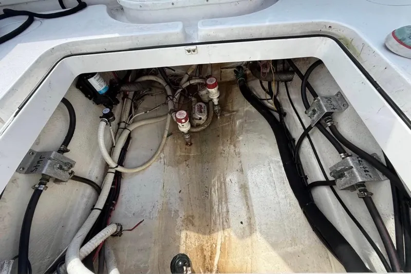  Yacht Photos Pics 2004 Yellowfin 36 Offshore boat wiring and plumbing compartment.