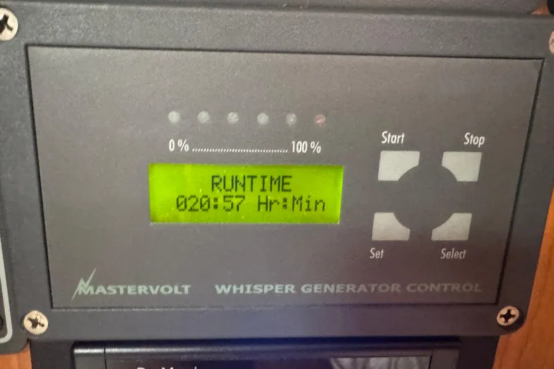 Pelican Yacht Photos Pics Mastervolt Whisper Generator Control displaying runtime of 20 hours and 57 minutes.