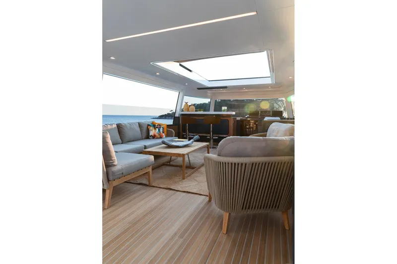  Yacht Photos Pics Luxurious interior of 2027 Sirena 78 yacht with modern seating and ocean view.