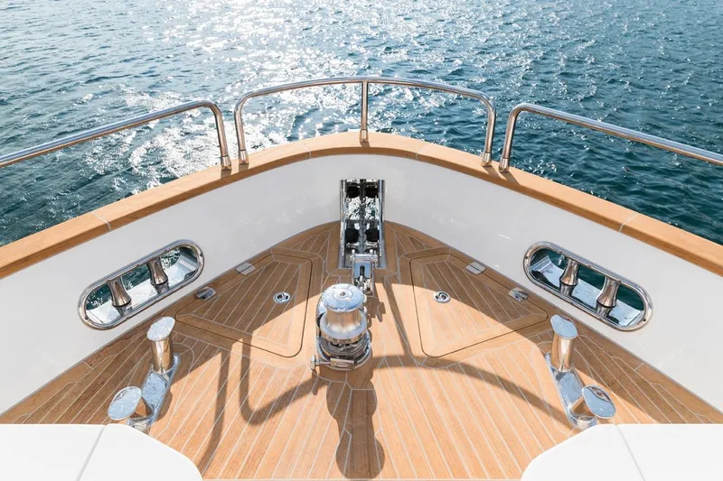  Yacht Photos Pics Bow of 2027 Sirena 78 yacht with teak deck and ocean view.