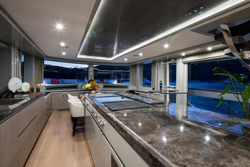  Yacht Photos Pics Luxurious interior of 2027 Sirena 78 yacht with modern kitchen and elegant decor.