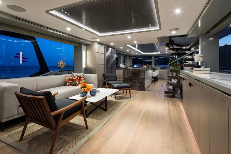  Yacht Photos Pics Luxurious interior of 2027 Sirena 78 yacht with modern furnishings and elegant lighting.