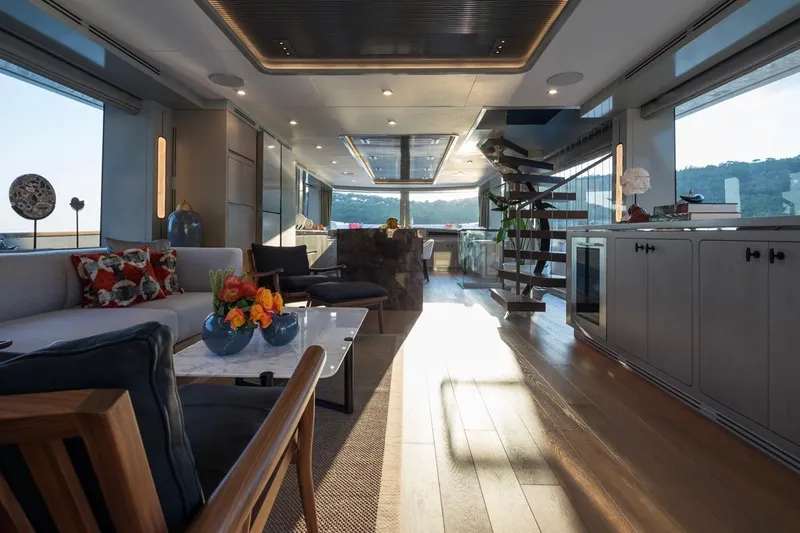  Yacht Photos Pics Luxurious interior of 2027 Sirena 78 yacht with modern decor and panoramic windows.