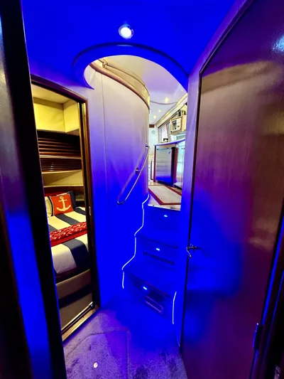 Journey Yacht Photos Pics Interior of 1999 Carver 450 Pilothouse yacht with blue ambient lighting.