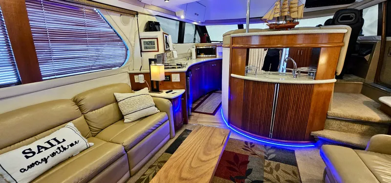 Journey Yacht Photos Pics Luxurious interior of a 1999 Carver 450 Pilothouse yacht with modern amenities.
