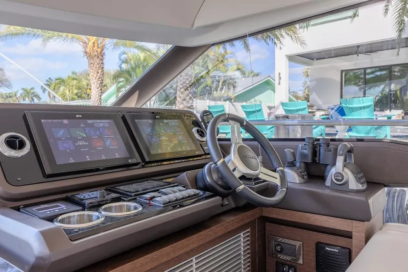 Happy Cay Yacht Photos Pics Prestige 520 Flybridge 2021 yacht helm with modern navigation displays and controls.
