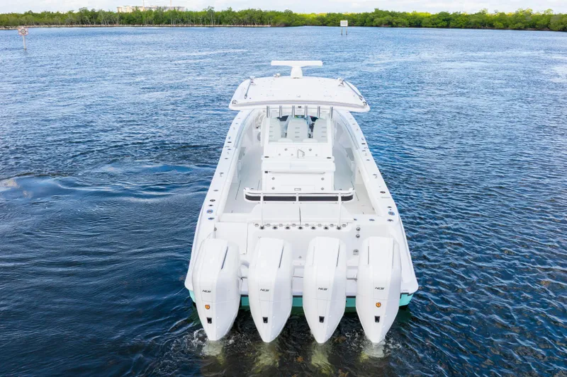  Yacht Photos Pics 2026 HCB 42 Lujo boat with four engines on open water.