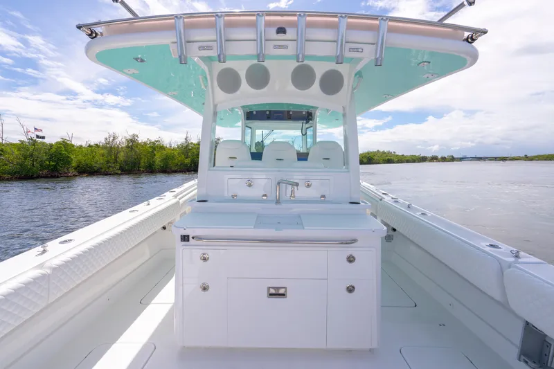  Yacht Photos Pics 2026 HCB 42 Lujo boat interior with sleek design and modern amenities on a calm waterway.