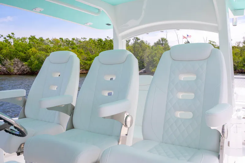  Yacht Photos Pics Luxurious seating on 2026 HCB 42 Lujo boat, featuring elegant white upholstery.