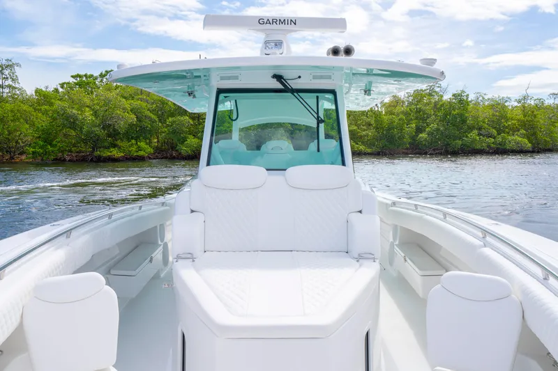  Yacht Photos Pics Luxurious 2026 HCB 42 Lujo boat with sleek white seating and modern design.