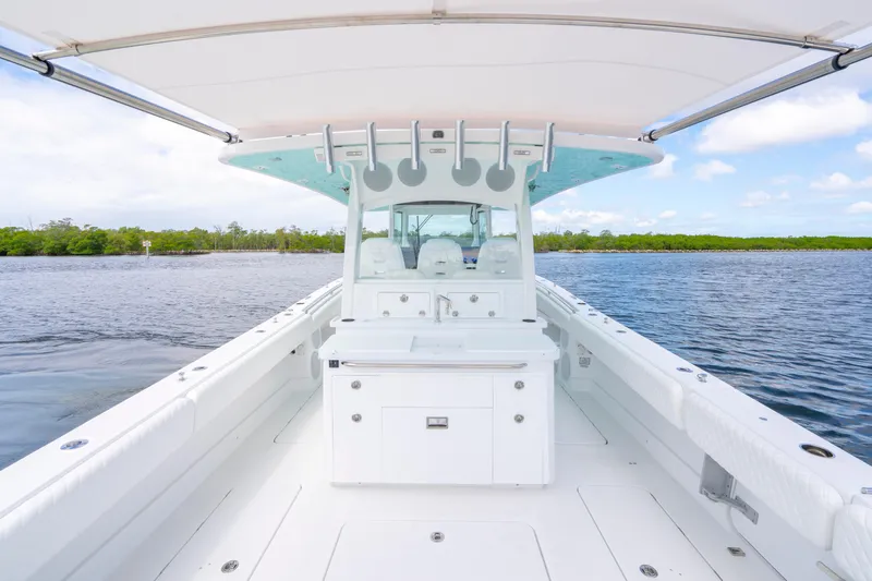  Yacht Photos Pics 2026 HCB 42 Lujo boat interior with sleek design on calm water.