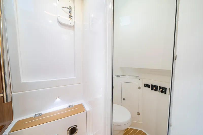  Yacht Photos Pics Luxurious bathroom interior of 2026 HCB 42 Lujo boat, featuring modern fixtures and sleek design.