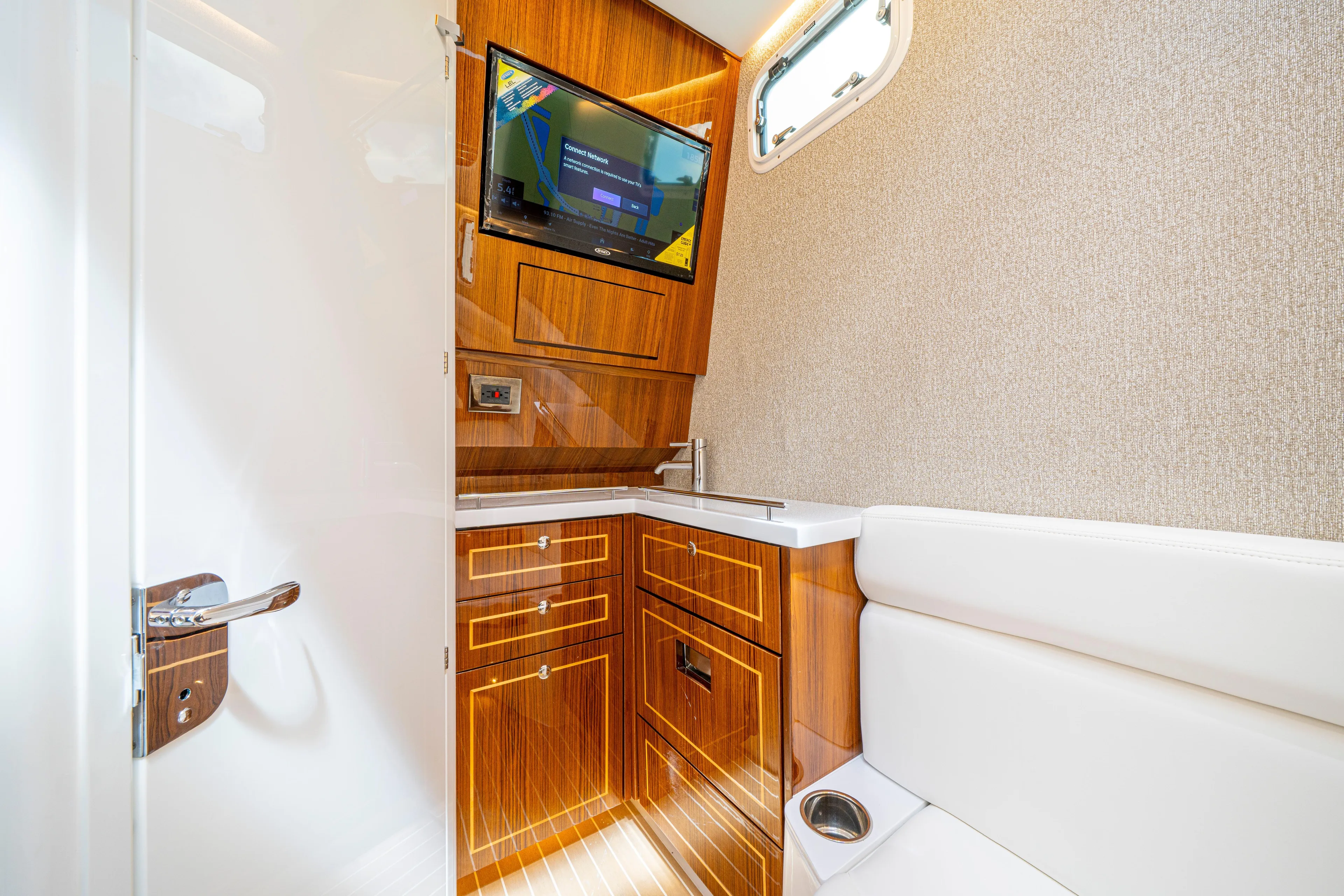  Yacht Photos Pics Luxurious interior of 2026 HCB 42 Lujo yacht with wood cabinetry and modern amenities.