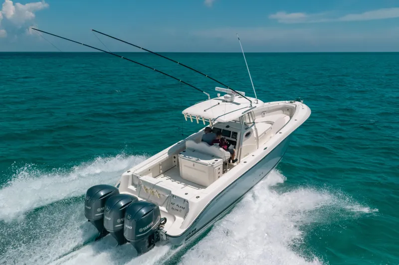  Yacht Photos Pics 2008 Hydra-Sports Vector 3300 CC boat cruising on open ocean waters.