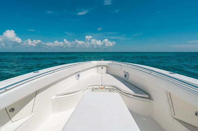  Yacht Photos Pics 2008 Hydra-Sports Vector 3300 CC boat on open ocean under clear blue sky.