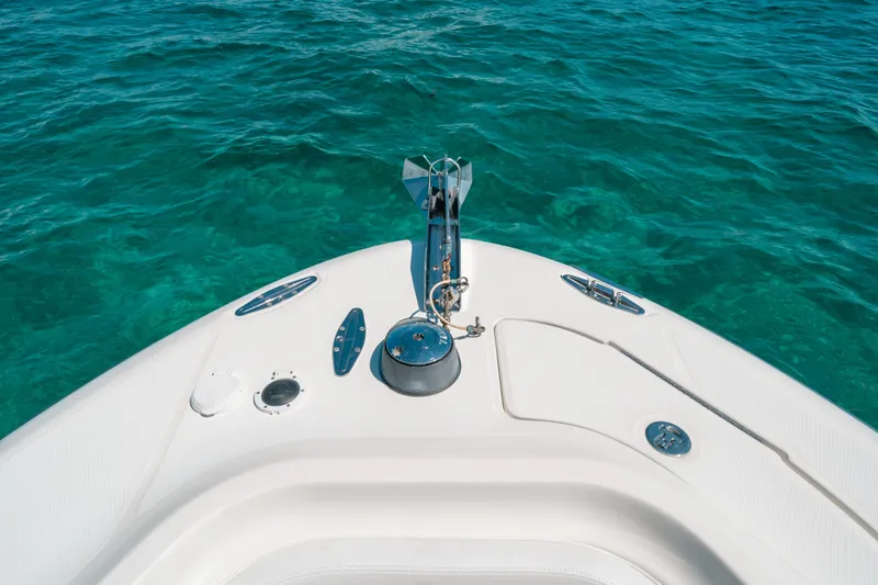  Yacht Photos Pics Bow of 2008 Hydra-Sports Vector 3300 CC on clear turquoise water.