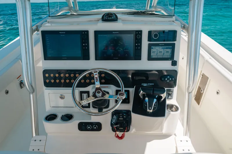 Yacht Photos Pics 2008 Hydra-Sports Vector 3300 CC boat dashboard with modern navigation equipment.