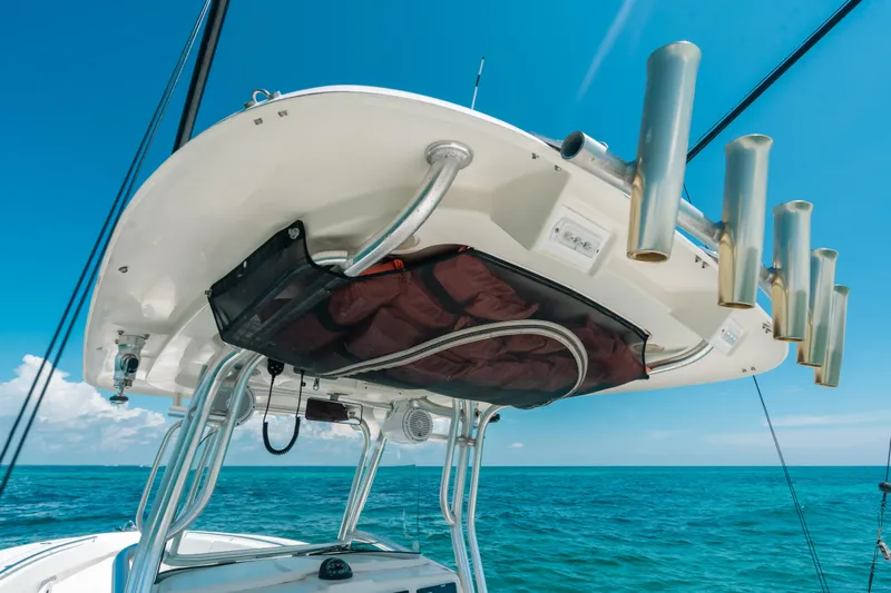  Yacht Photos Pics 2008 Hydra-Sports Vector 3300 CC boat with rod holders, ocean view, and clear blue sky.