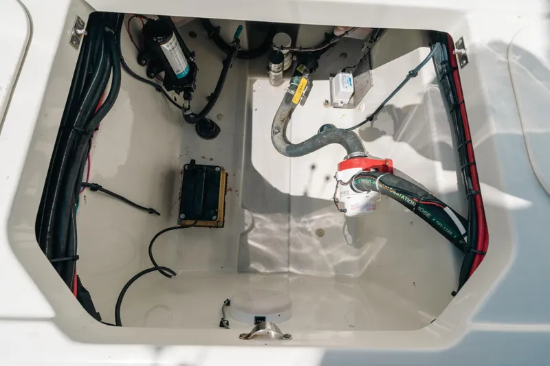  Yacht Photos Pics 2008 Hydra-Sports Vector 3300 CC boat compartment with wiring and hoses.