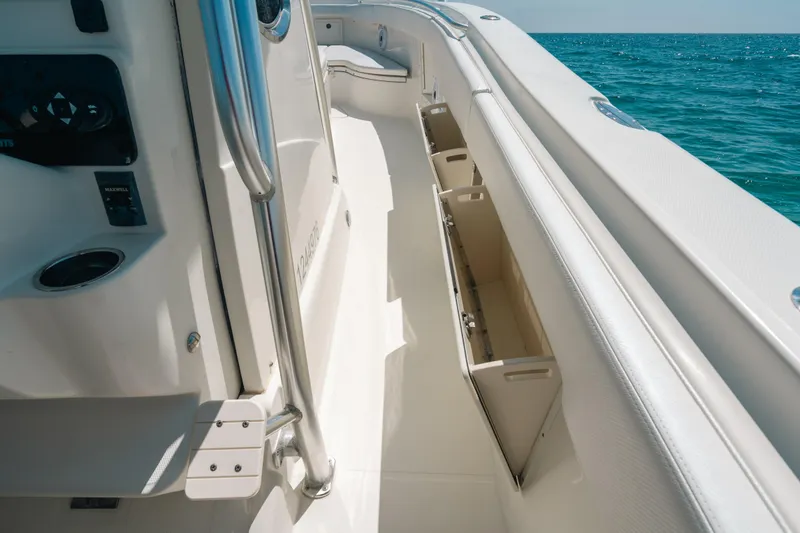  Yacht Photos Pics 2008 Hydra-Sports Vector 3300 CC boat interior with storage compartments, ocean view.