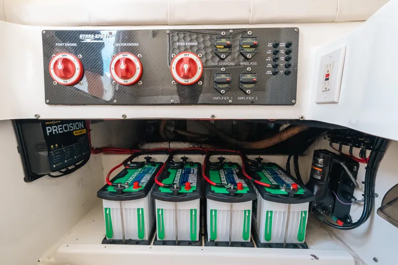  Yacht Photos Pics 2008 Hydra-Sports Vector 3300 CC boat battery compartment with control panel and wiring.