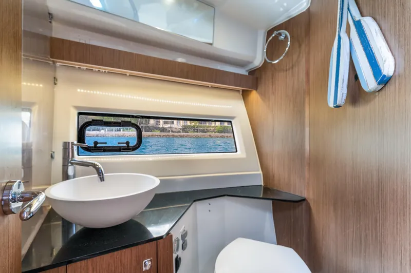  Yacht Photos Pics Modern bathroom interior on 2019 Jeanneau NC 1095 boat with sleek design.