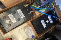 Batteries in a 1991 Trader 47 boat engine compartment with wiring and components.