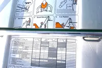 Inflatable liferaft instructions on a 1991 Trader 47 boat, featuring safety guidelines and specifications.