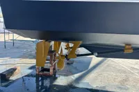 Underwater view of 1991 Trader 47 yacht's propeller and rudder system.