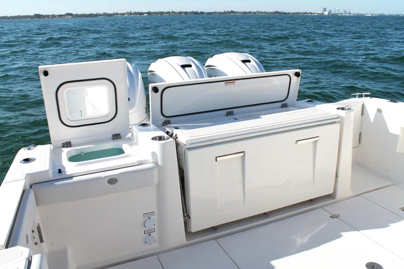  Yacht Photos Pics 2023 Pursuit S 378 Sport boat with dual engines on open water.