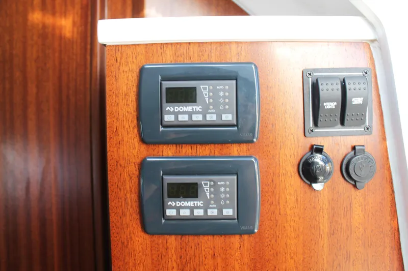  Yacht Photos Pics Control panel on 2023 Pursuit S 378 Sport boat with Dometic displays and switches.