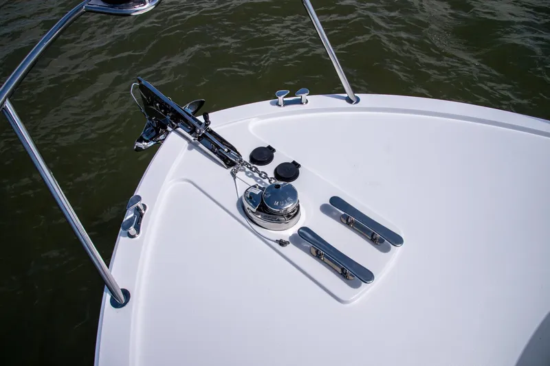 In Stock Yacht Photos Pics Bow of 2025 MJM 35 boat with anchor and cleats on calm water.