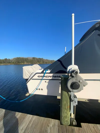 On Wine Time Yacht Photos Pics 2009 Grady-White Chesapeake 290 boat docked on a sunny day.