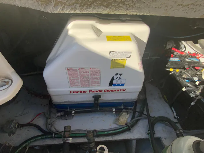 On Wine Time Yacht Photos Pics Fischer Panda generator in 2009 Grady-White Chesapeake 290 boat engine compartment.
