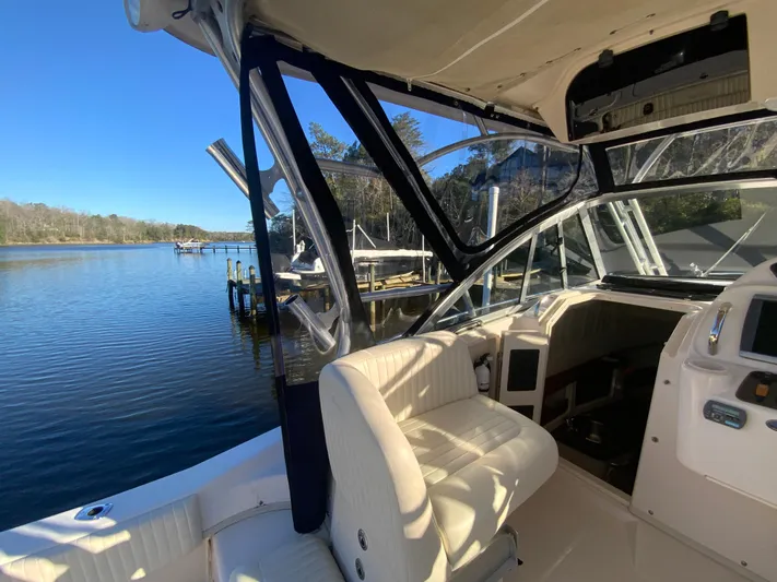 On Wine Time Yacht Photos Pics 2009 Grady-White Chesapeake 290 boat interior with scenic waterfront view.