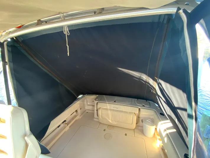 On Wine Time Yacht Photos Pics 2009 Grady-White Chesapeake 290 boat interior with protective canopy.