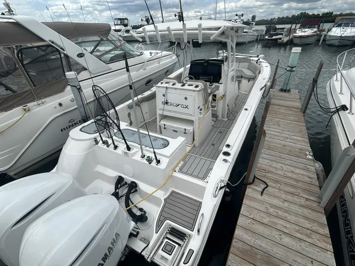  Yacht Photos Pics 2018 Sea Fox 288 Commander boat docked, featuring dual Yamaha engines and fishing equipment.