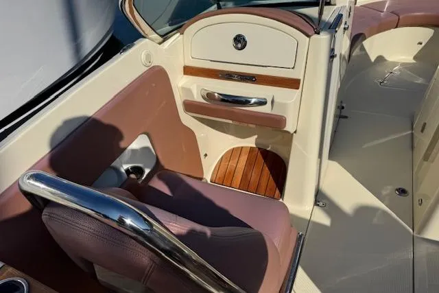 Snippy Yacht Photos Pics 2019 Chris-Craft Launch 30 interior with elegant seating and wood accents.