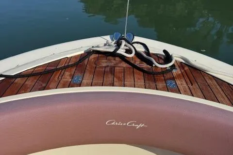 Snippy Yacht Photos Pics 2019 Chris-Craft Launch 30 boat with teak deck and mooring lines.
