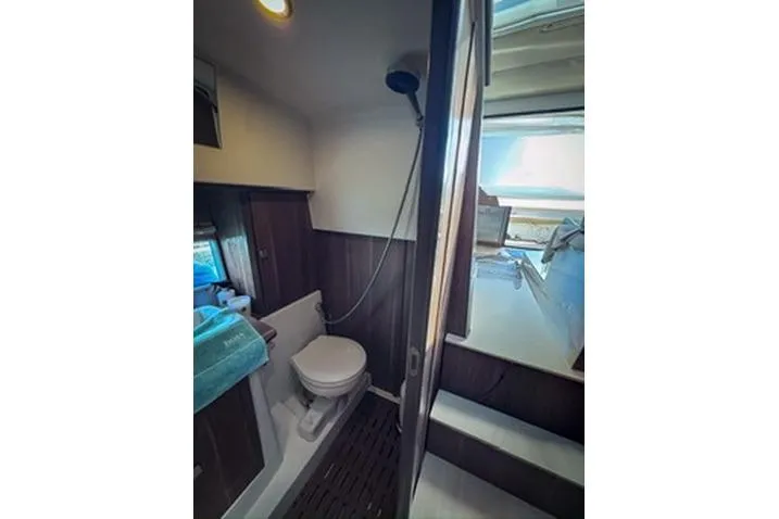  Yacht Photos Pics Bathroom interior of 2016 Sealine C330 yacht with shower and toilet.