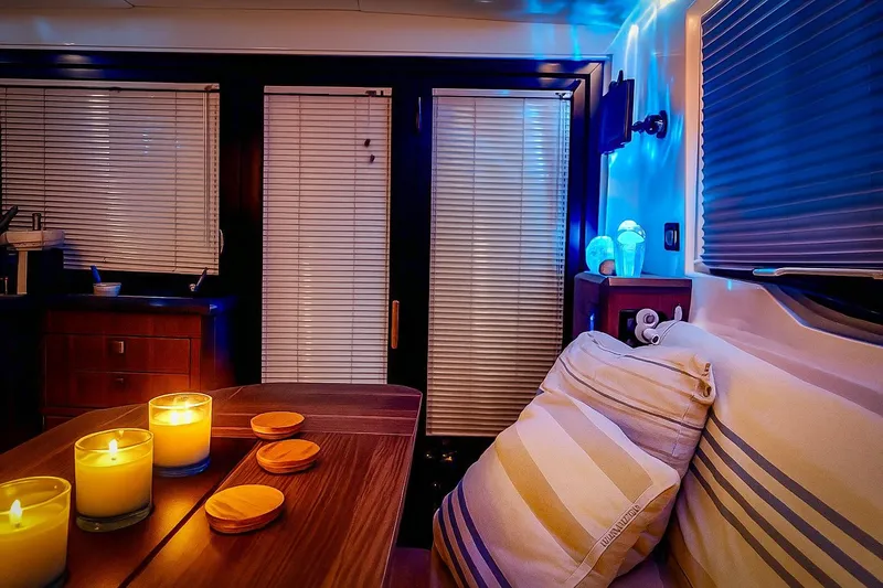  Yacht Photos Pics Cozy interior of 2016 Sealine C330 yacht with candles and ambient lighting.