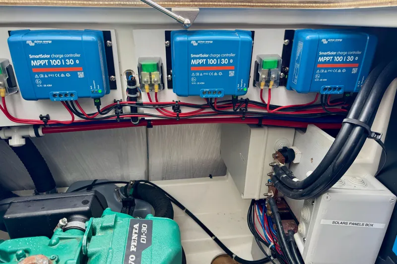 Khonsu Yacht Photos Pics 2023 Fountaine Pajot Isla yacht solar charge controllers and wiring setup.