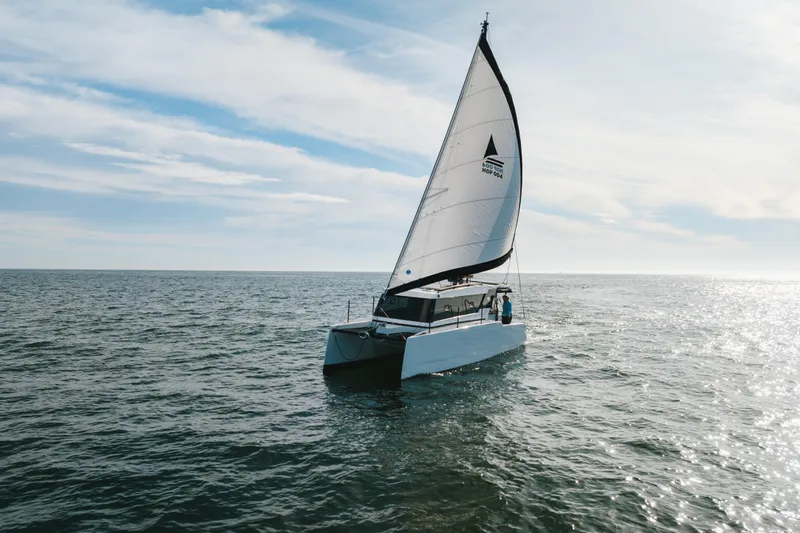 Sol Provider Yacht Photos Pics Sailing Hop Yacht 30 on open sea under clear sky, 2023 model.