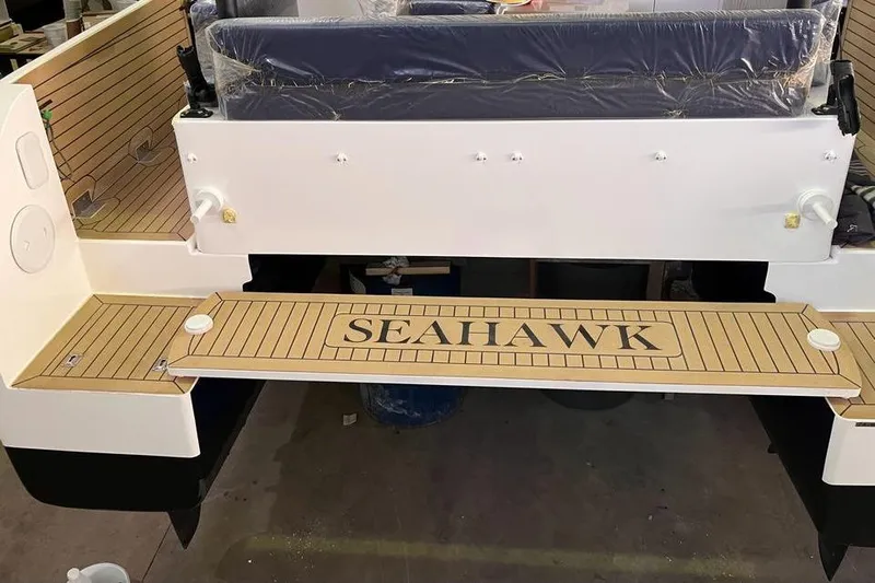 Sol Provider Yacht Photos Pics 2023 Hop Yacht 30 rear view with "SEAHawk" on deck.