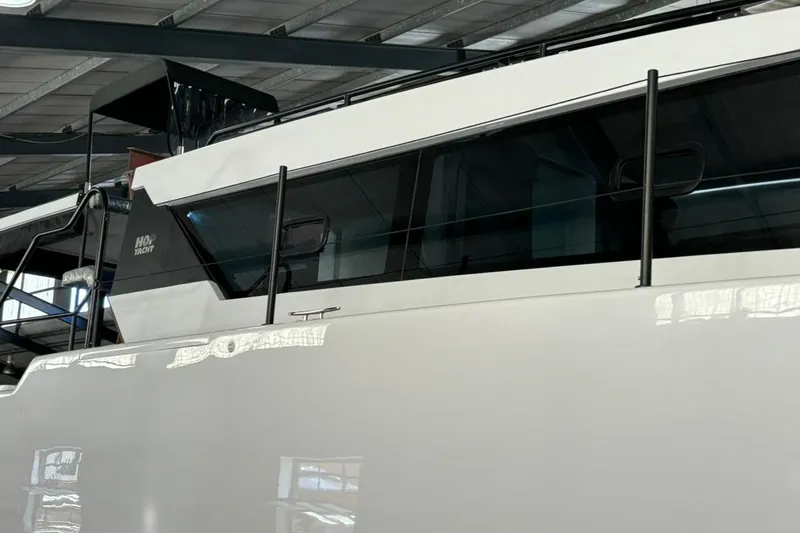 Sol Provider Yacht Photos Pics 2023 Hop Yacht 30 in a showroom, showcasing sleek design and modern features.