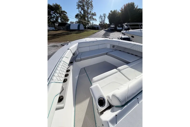  Yacht Photos Pics 2022 Regal 38 SAV boat interior with spacious seating and cup holders.