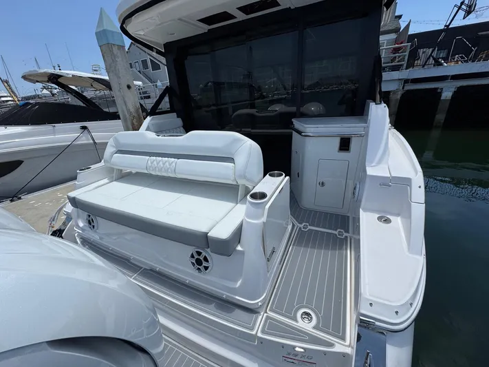 36 Xo Yacht Photos Pics 2026 Regal 36 XO yacht's rear deck with seating and sleek design.
